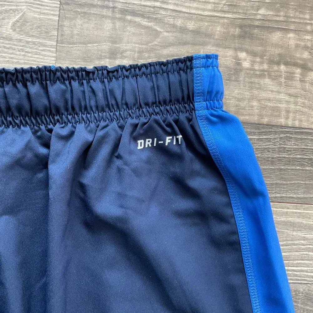 NWT Nike Team Woven Dri Fit Training Pants Men’s MEDIUM Blue Cord Hem 377786-451